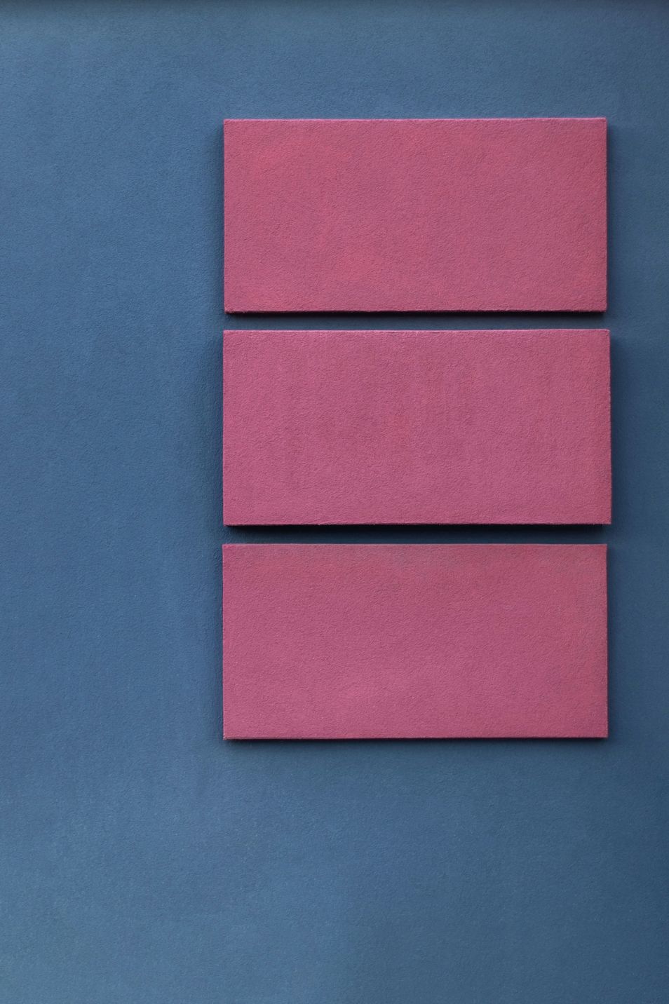 Best trademark search solutions, image of three pink blocks on a blue wall