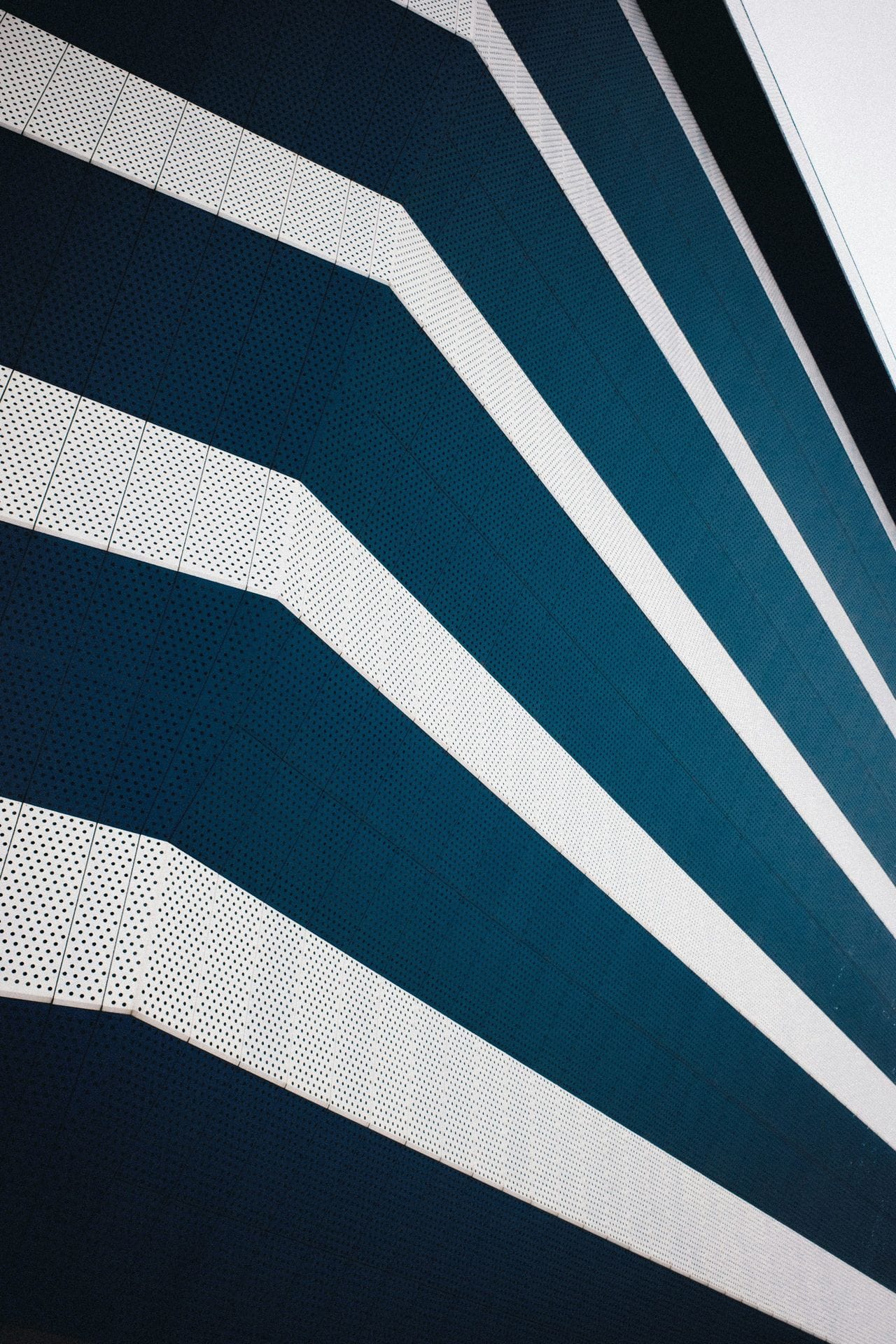 Modern brand protection, impersonators, impersonation protection, image of blue multi-storey building
