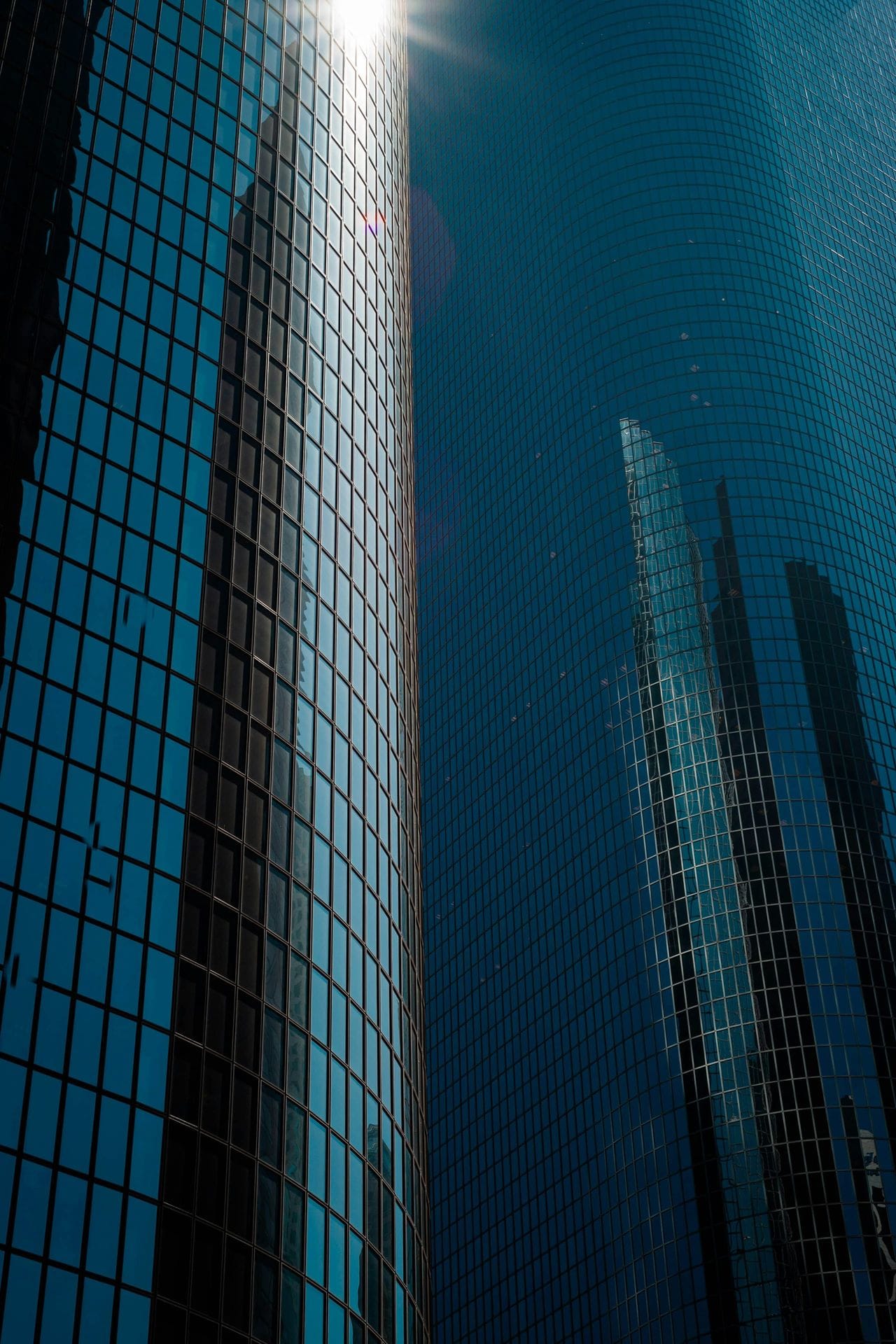 Trademark search cost, image of light reflecting on blue building
