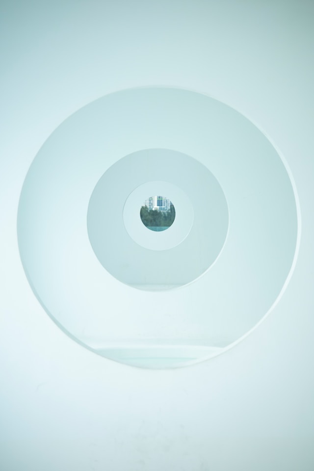 Centralized patent management services, testimonial, image of blue circles