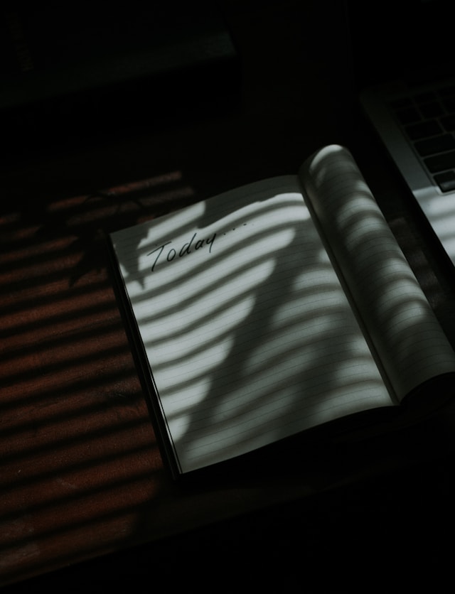 IP filing service, list of client challenges, image of notebook
